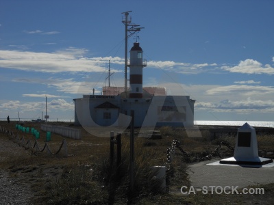 Lighthouse sea patagonia water sky.