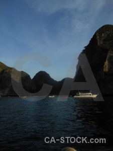 Limestone island southeast asia cliff cloud.