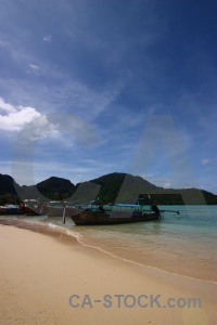 Long tail bay mountain asia boat.