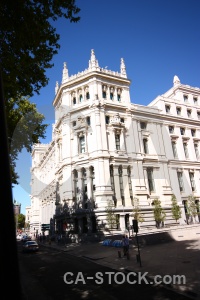 Madrid bush building tree sky.