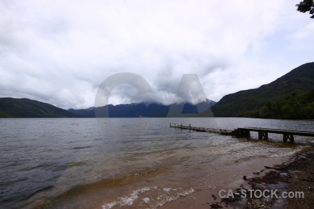 Mountain lake hauroko new zealand cloud sand.