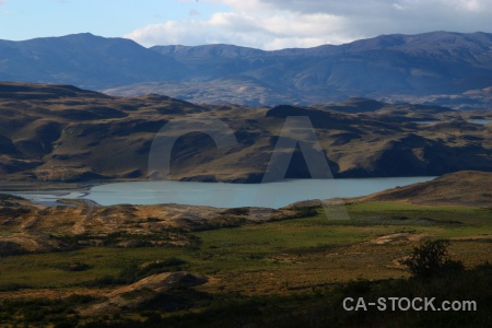 Mountain sky landscape lago amarga grass.