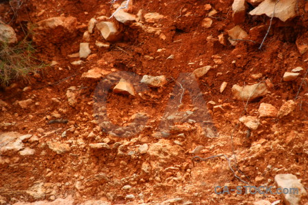 Orange texture stone red soil.