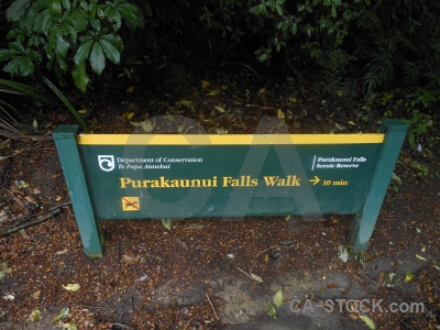 Owaka purakaunui falls sign south island new zealand.