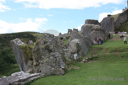 Person building green white castle.