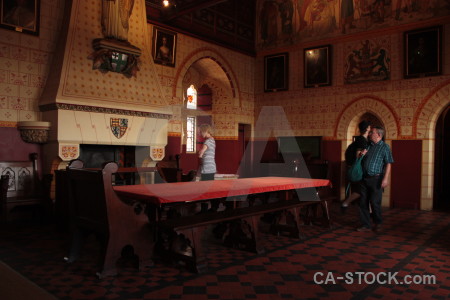 Person interior building red table.