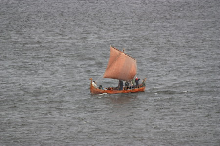 Person vehicle boat gray.