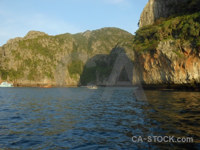 Phi phi island sea water rock sky.