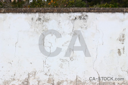 Plaster white crack wall texture.