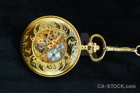 Pocket watch black object yellow.