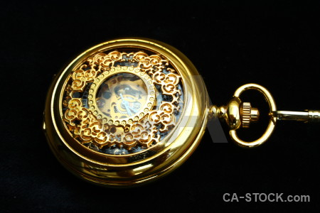 Pocket watch yellow object black.