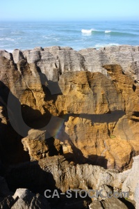 Punakaiki pancake rocks sea new zealand south island.