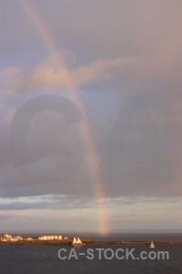 Rainbow cloud gray sky.