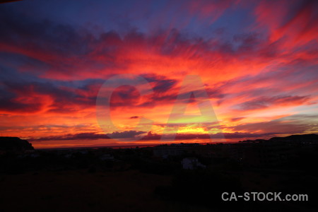 Red sunrise purple blue orange.