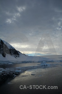 Reflection antarctica cruise gunnel channel sky cloud.