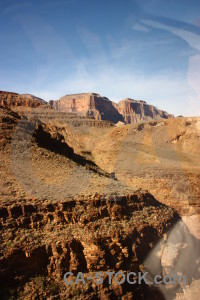 Rock brown blue orange landscape.