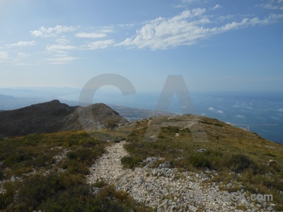 Rock sky cloud javea path.