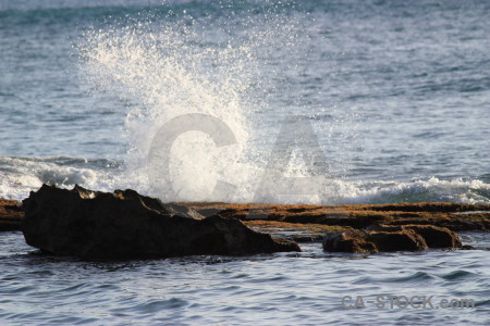 Rock water sea surface wave.