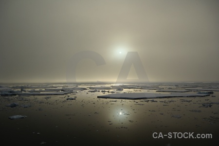 Sea antarctica snow cloud reflection.