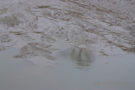 Sea gray water surface mud.