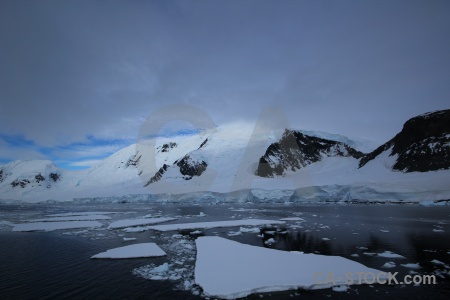 Sea ice gunnel channel antarctic peninsula mountain snow.