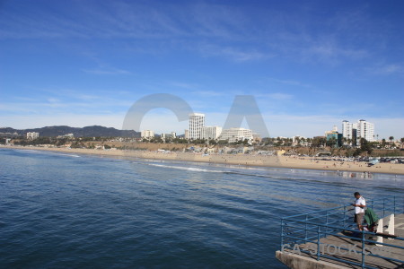 Sea person cityscape water beach.