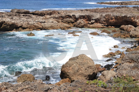 Sea rock water wave surface.