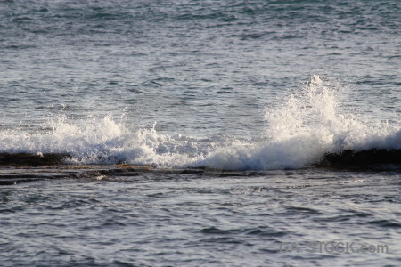 Sea rock wave surface water.