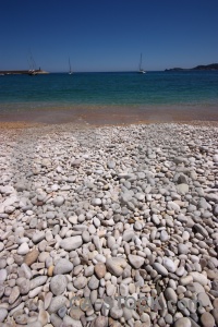 Sea stone water beach sky.