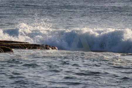 Sea surface rock water wave.