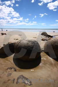 Sky beach rock sand cloud.