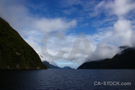 Sky mountain fiord fiordland south island.