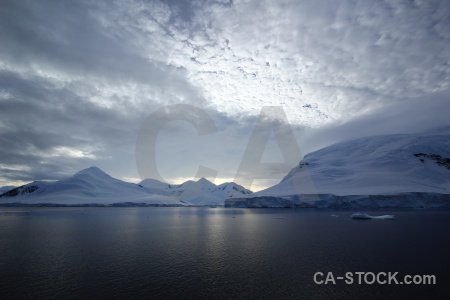 Snowcap antarctic peninsula cloud antarctica cruise sky.