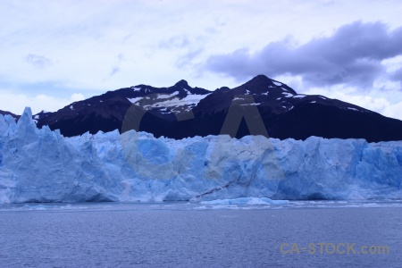 Snowcap terminus glacier ice sky.