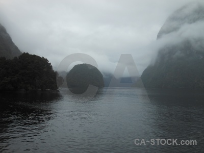 Sound sky mountain fiord tree.