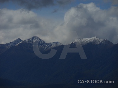 South island manapouri sky snowcap new zealand.