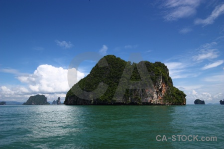 Southeast asia tropical tree sky limestone.