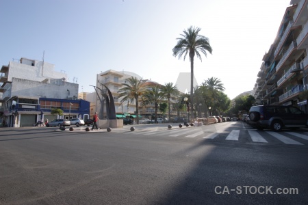 Spain europe road palm tree building.