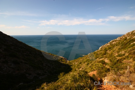 Spain sea cloud water bush.