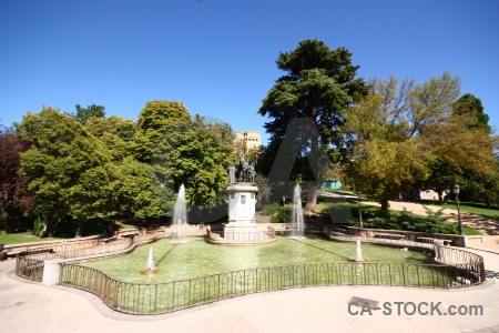 Spain tree sky water pool.