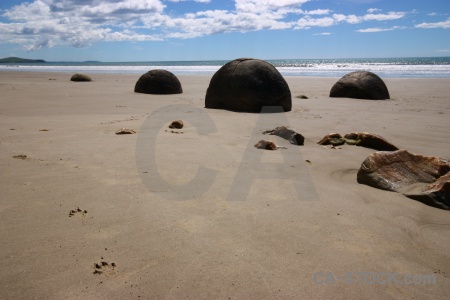 Spherical south island landscape sand moeraki boulders.