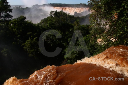 Spray sky iguassu falls iguazu river water.