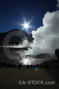 Steam geyser el tatio chile sun.