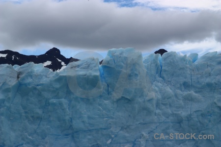 Terminus perito moreno ice mountain sky.