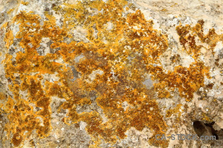 Texture rock orange yellow brown.