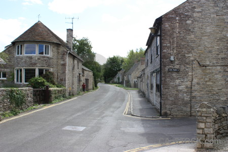 Village white street building.