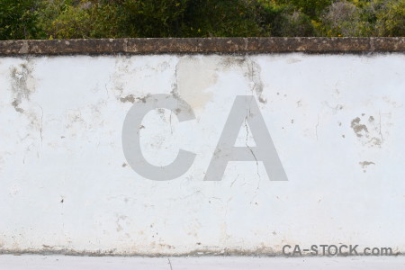 Wall crack plaster texture white.