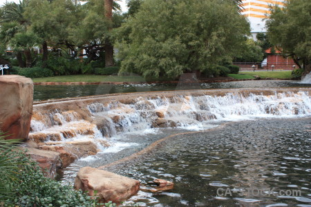 Water fountain pool green waterfall.