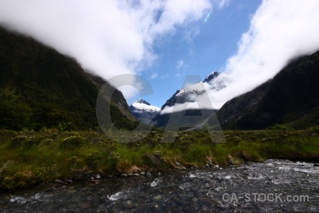 Water mountain hollyford river sky south island.