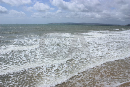 Water sea wave white beach.